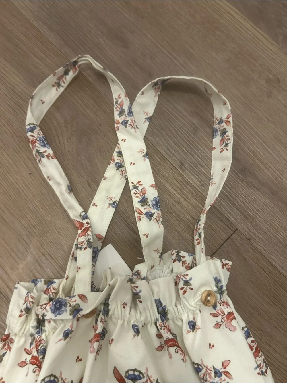 Floral Cream Baby Romper with Crossback Straps